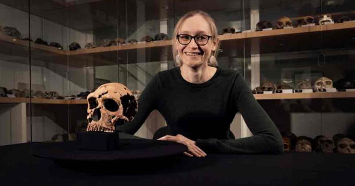 Dr Emma Pomeroy (University of Cambridge) with the skull of Shanidar Z in the Henry Wellcome Building in Cambridge, home of the University’s Leverhulme Centre for Human Evolutionary Studies. 	Source: BBC Studios/Jamie Simonds/University of Cambridge