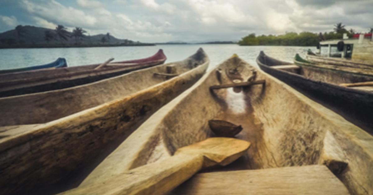 Wooden canoes. Credit: hanohiki / Adobe Stock