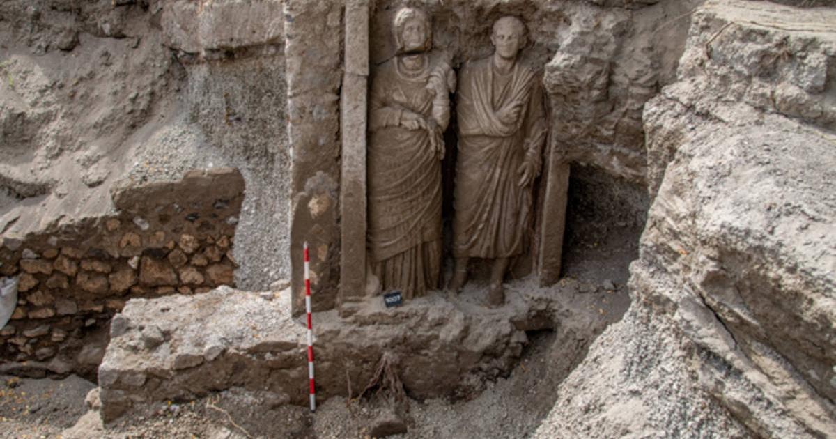 Funerary monument featuring two life-sized statues found at Porta Sarno necropolis, Pompeii.