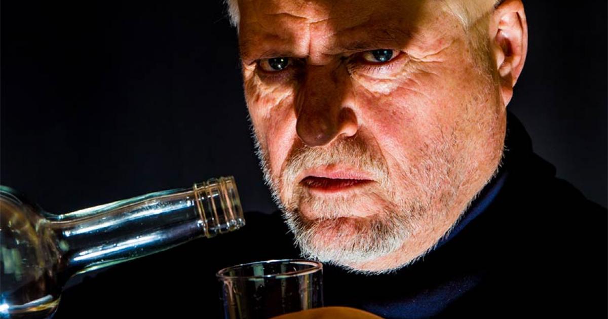 Man drinking alcohol. Credit: Rainer Fuhrmann / Adobe Stock