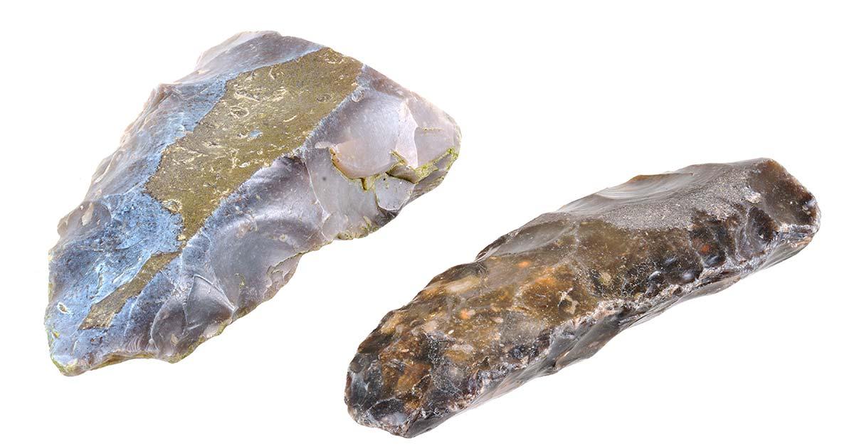 Stone axe and knife (representational). Source: JPS / Adobe Stock.