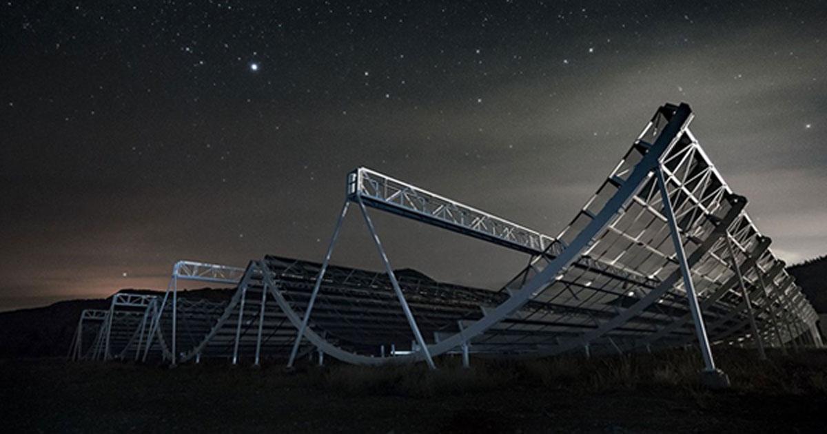 The CHIME telescope looking up at the night sky. The Canadian telescope has captured new bizarre radio signals from 1.5 billion light years away.