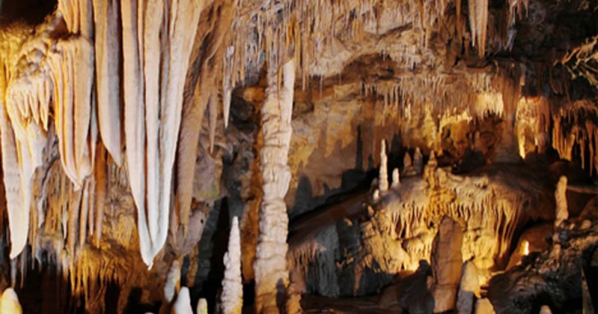 Cave stalactites and stalagmites. Credit: Santi Rodríguez / Adobe Stock