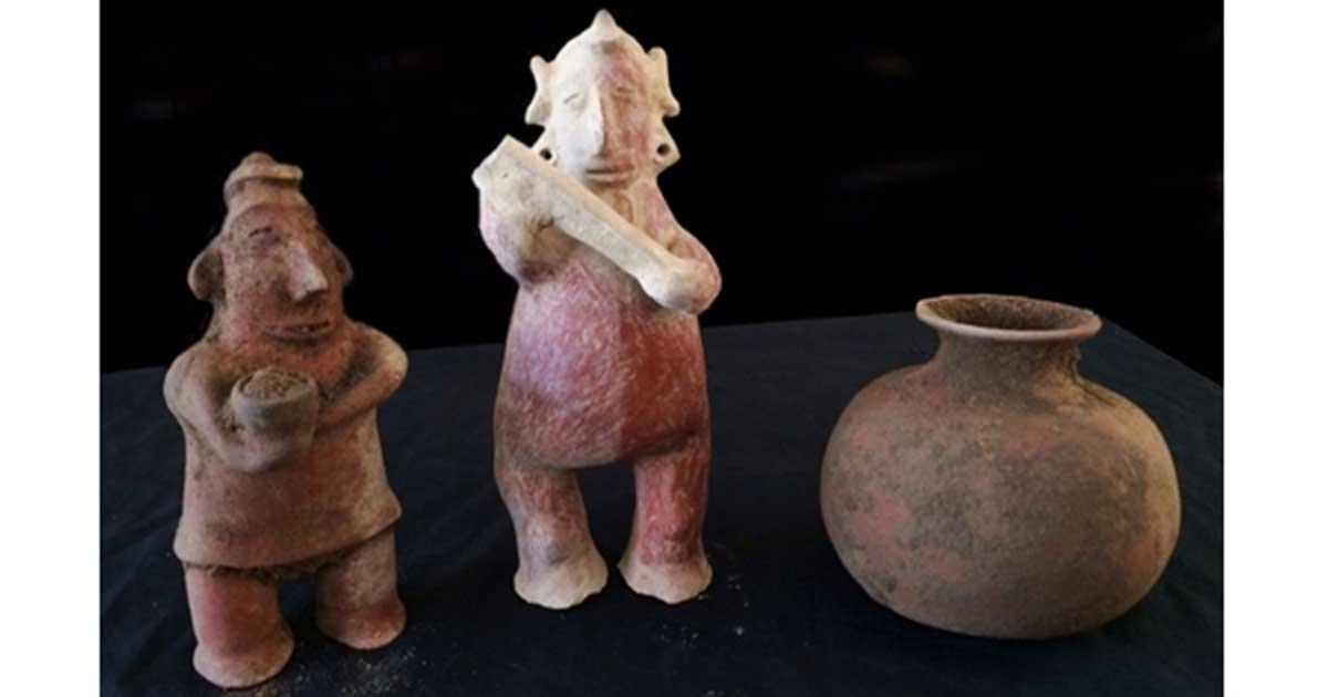 Figurines discovered in recently-unearthed tomb in Mexico.