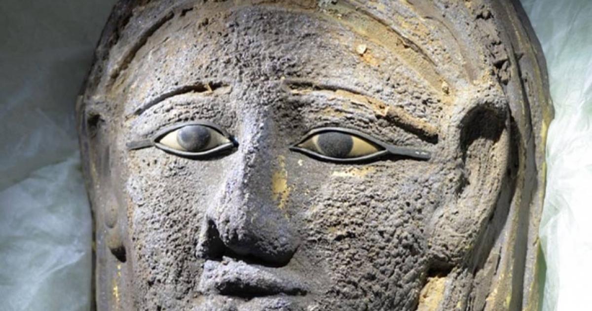 The silver facemask gilded with gold found on the face of the mummy.