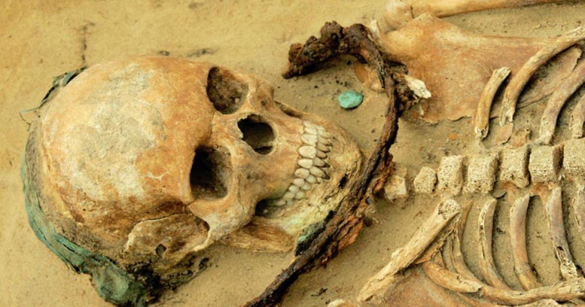 A girl age 14 to 19 was buried with a sickle across her throat, a copper headband and a coin near her mouth; the authors of a new study said her community may have thought she had demonic tendencies. 