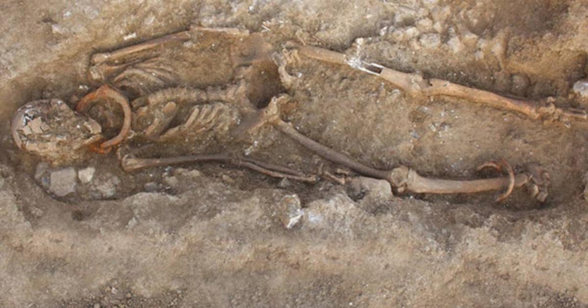Shackled adult and child skeletons unearthed in ancient Roman necropolis in France