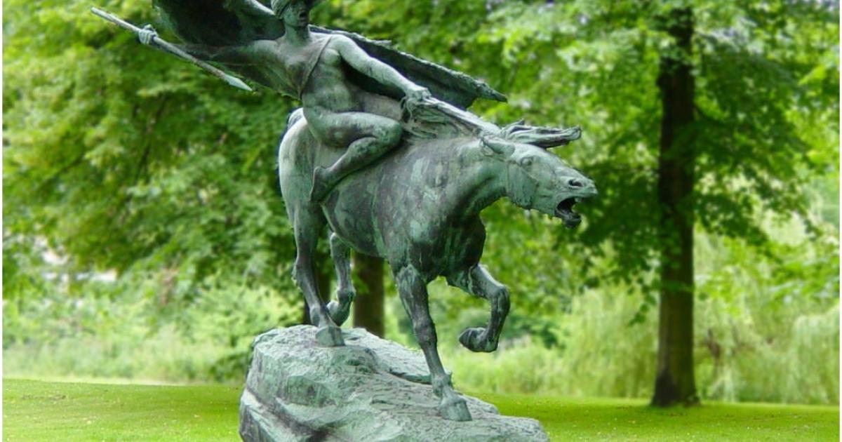 A statue of a Norse valkyrie, or battle maiden, on a horse in a park in Copenhagen, Denmark