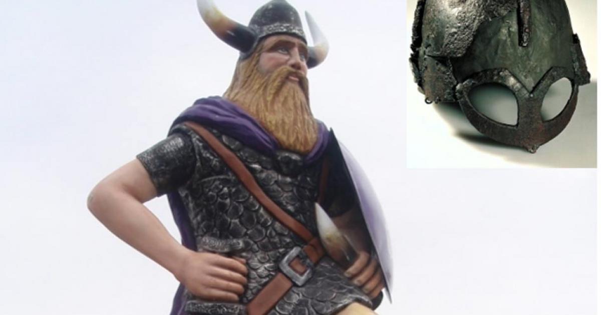 A modern statue of a Viking with the mythical horned helmet 