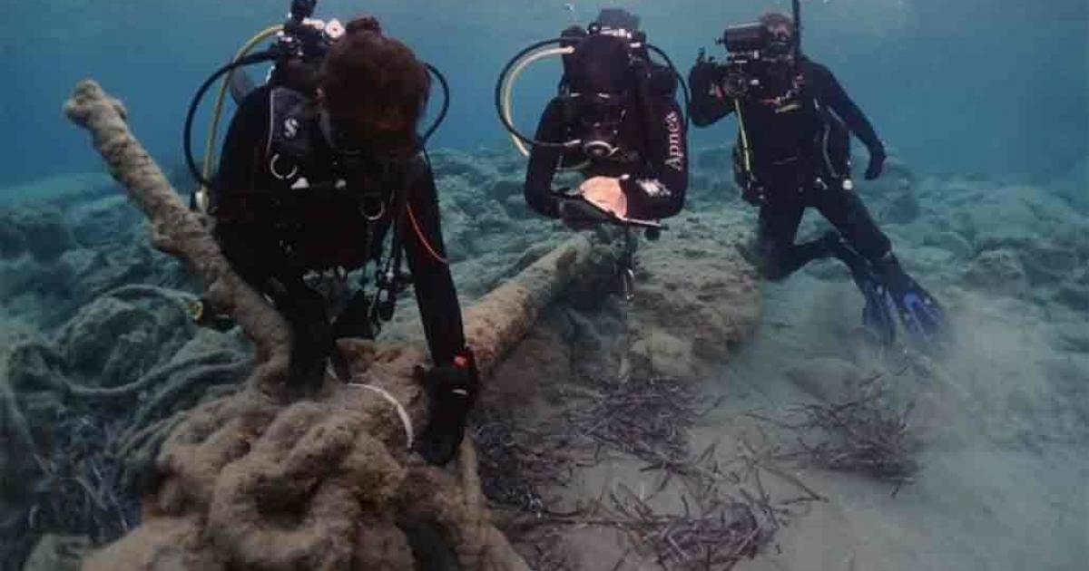 Researchers logging an anchor at one of the ten shipwreck sites found off Kasos. Source: Greek Ministry of Culture