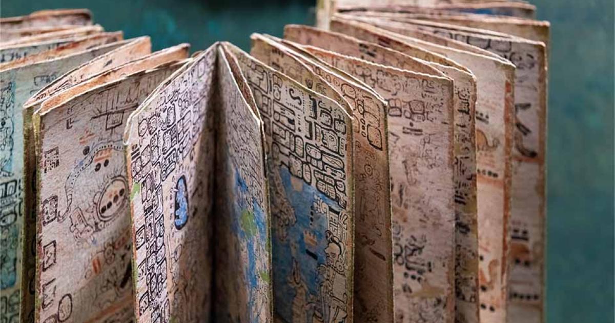 Mayan codex with hieroglyphic alphabet script writing system, Mexico City, Mexico. Source: SL-Photography / Adobe Stock.