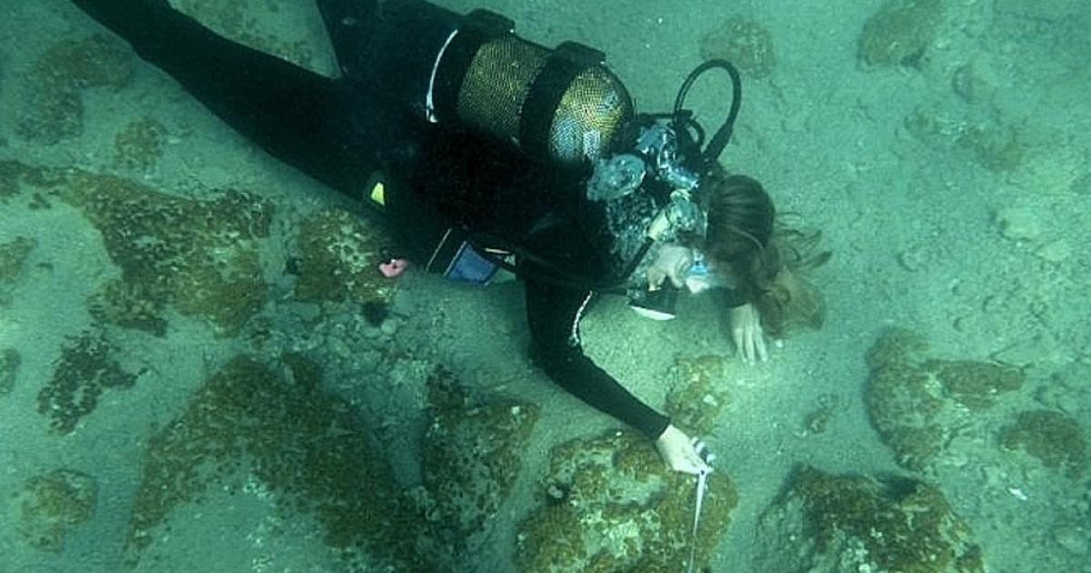 A diver exploring the newly-discovered Greek city in the Aegean Sea 