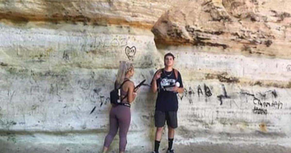 Pictures posted on online of the vandals who damaged the Council Overhang cavern in Starved Rock Park in Illinois over the Labor Day holiday. Source: Daily Mail / Fair Use.