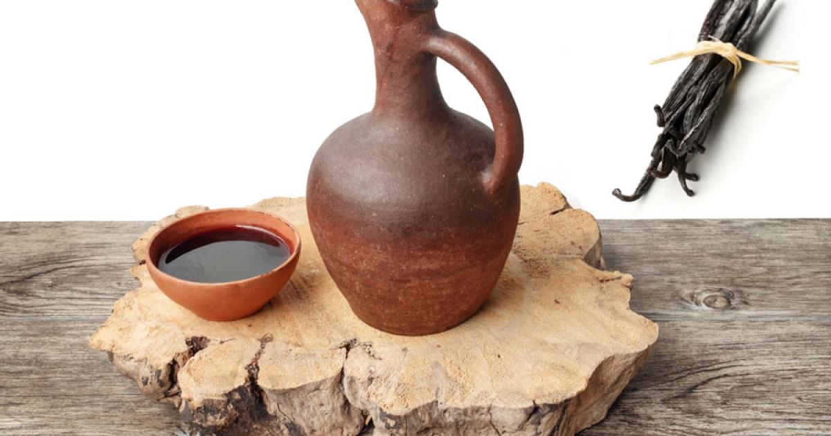 Ancient wine and amphorae. Source:  Luka / Adobe Stock. Inset: Vanilla bean. Source: Shawn Hempel / Adobe Stock