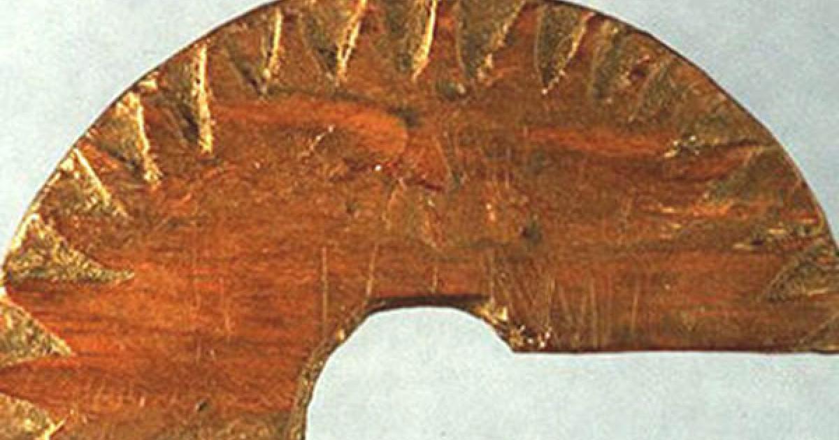 Wooden fragment discovered in Uunartoq, Greenland, in 1948, which is believed to be a sun-compass used to determine direction