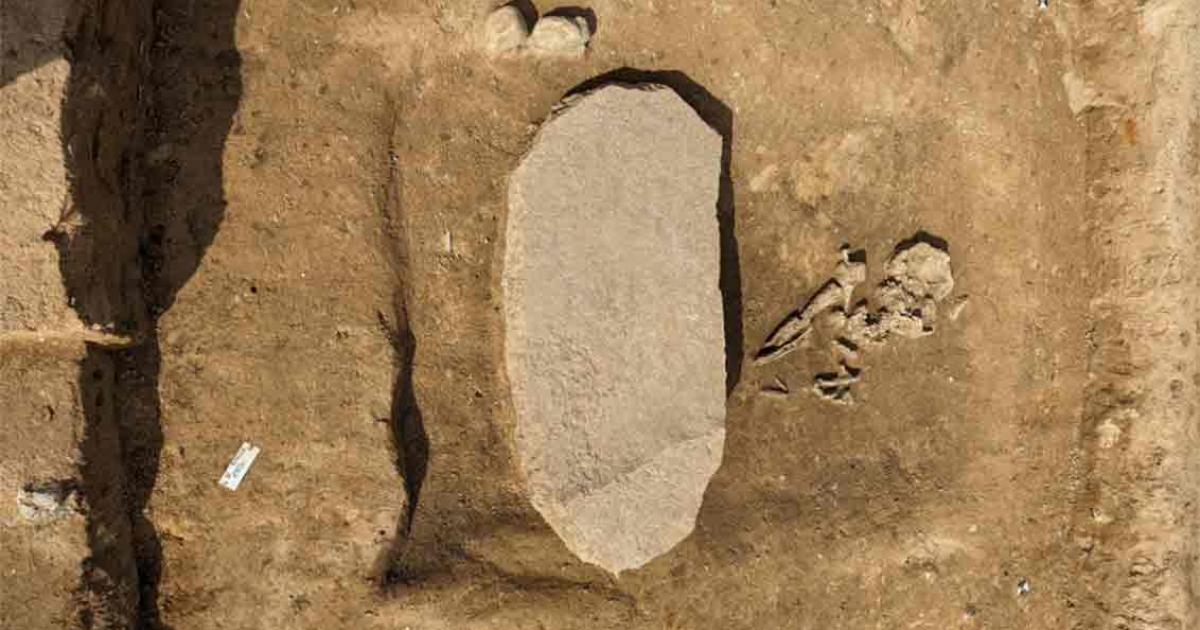 The 4,200-year-old grave with the large stone designed to stop the “zombie” within rising once again. Source: LDA Saxony-Anhalt, Anja Lochner-Rechta / Miami Herald.