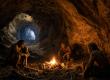 Image portraying early human ancestors working with fire in Wonderwerk Cave.
