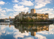 Pembroke Castle in Pembrokeshire, Wales. Archaeologists from the University of Aberdeen are excavating Wogan Cavern beneath the medieval fortress, where preserved sediments contain evidence of human occupation and environmental change stretching back more than 100,000 years