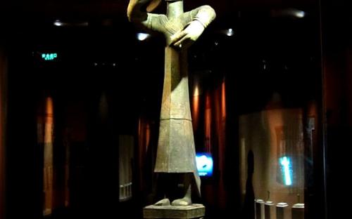 An upright bronze figure representing the high priest of Sanxingdui. (Wikipedia)