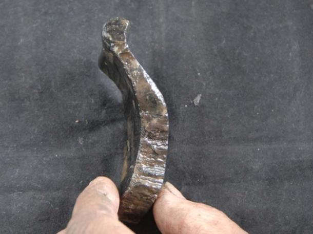 2000-year-old wooden bowl fragment found at Cairns Broch, South Ronaldsay. (UHI Archaeology Institute)