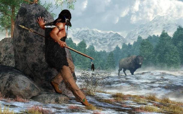 3D Rendering of a prehistoric Native American hunter wearing furs and carrying an atlatl and spear as he stalks a bison in a snow covered valley in the Rocky Mountains. (Daniel /Adobe Stock)