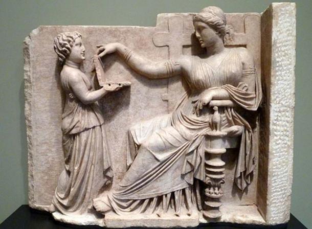 A child showing a woman (Greek, c. 100 BC) a wax writing tablet (CC by SA 2.0)