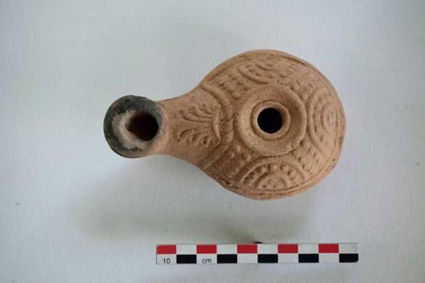 A decorated lamp recently found at the site. (Ministry of Antiquities)