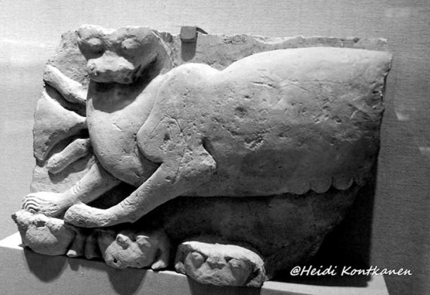 A fragmentary relief excavated in a temple dating to the 26th Dynasty (664–525 BC). However, its precise date, nature, and subject matter are uncertain. The female feline with lotus flower may be related to Hathor or some other goddess, and the falcon heads below her are possibly celestial symbols. This could also be a representation of Mafdet. Brooklyn Museum, New York.