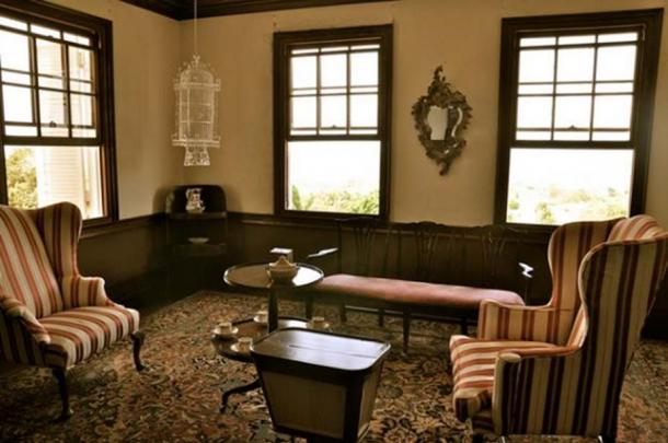 A sitting room with an allegedly ‘haunted mirror’ inside the Rose Hall Great House.