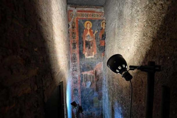 A wall had been placed over part of the medieval fresco during restoration works. (Il Messaggero)
