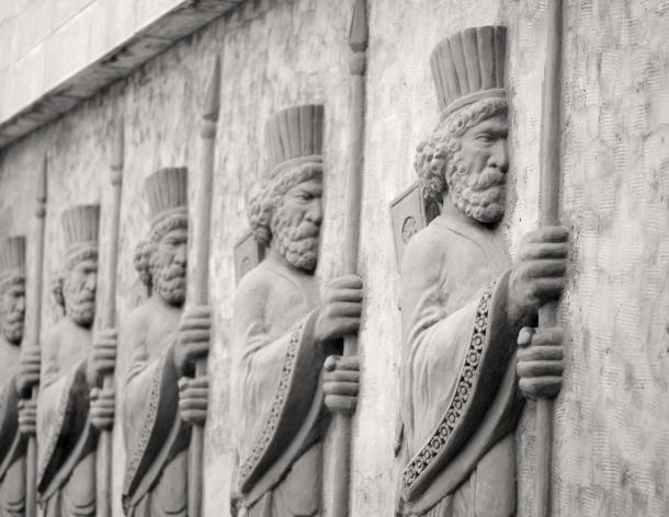 Achaemenid soldiers reliefs on concrete wall, Tehran, Iran. Source: Baharlou / Adobe Stock