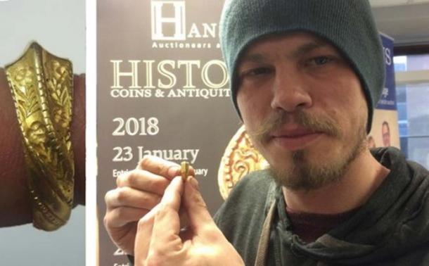 Adam Day with the ring, which is also shown left.