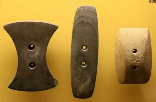 Adena culture gorget ornaments always two holes at Grave Creek Mound Museum. Moundsville, WV. Representative image 