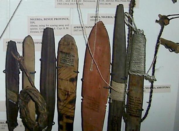 Seven variations of African bullroarers on display at the Pitt Rivers Museum, Oxford.