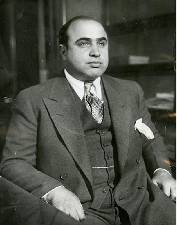 Al Capone is shown here in 1930 at the Chicago Detective bureau following his arrest on a vagrancy charge 