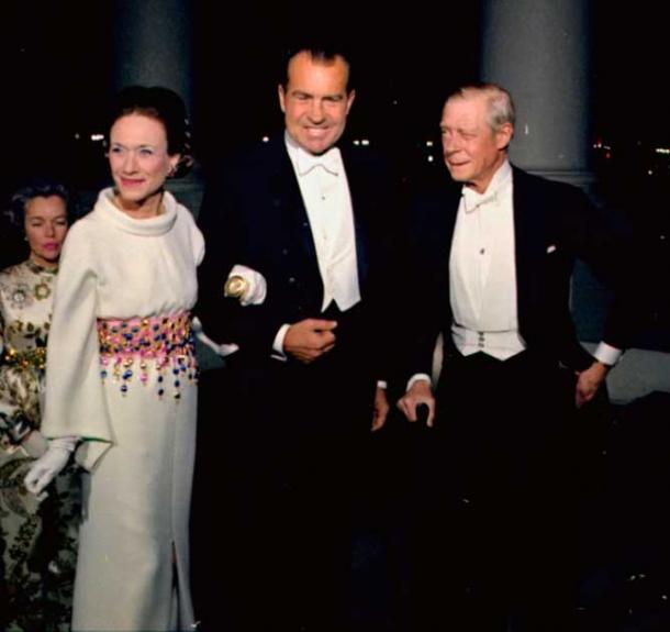 Although King Edward VIII abdicated for his American actress love Wallis Simpson, they remained active. The then-Duke and Duchess of Windsor are pictured here with US president Richard Nixon, 1970 (Public Domain)