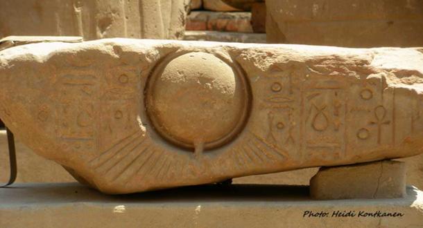 An Amarna Period block displays a deeply-engraved relief of the radiant sun disc, the Aten, whose introduction as the sole god by Pharaoh Akhenaten changed the course of Egyptian history. Karnak Temple.