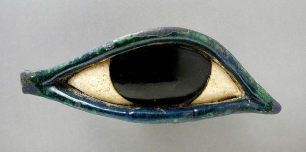 An eye made of glass and obsidian from a coffin belonging to the Late Period (724 - 333 BC). As an amulet, the popular Wedjat eye symbolized health and protection. (Los Angeles County Museum of Art)