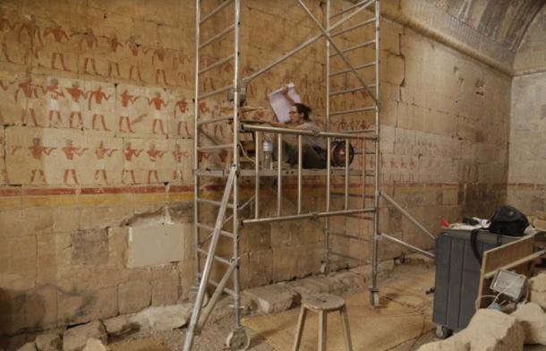 Anastasiia Stupko-Lubczynska verifying the drawing documentation in the Chapel of Hatshepsut. (Aleksandra Hallmann /Antiquity Publications Ltd)