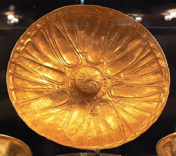 Ancient Greek golden phiale, or vessel with omphalos seen in the center.