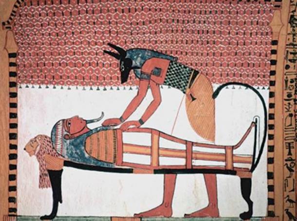 Anubis was the ancient Egyptian god associated with mummification and burial rituals, here he attends to a mummy. (Jeff Dahl / Public Domain)