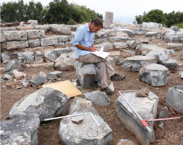 Archaeologist Christopher Ratté records architectural details of the Temple of Athena at Notion in western Turkey. (Photo courtesy of Notion Archaeological Project, University of Michigan)