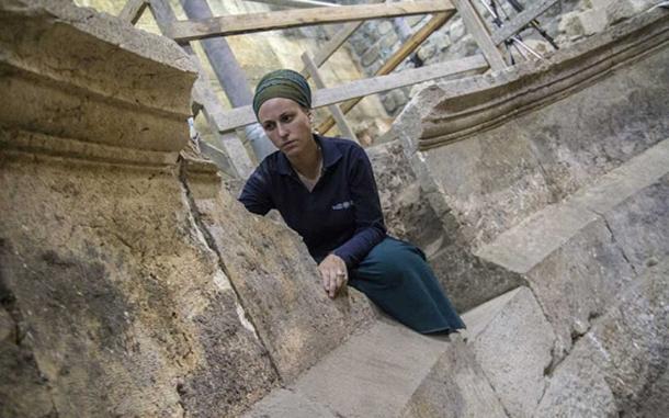 Archaeologist Tehillah Lieberman on unfinished steps (Image: Israel Antiquities)