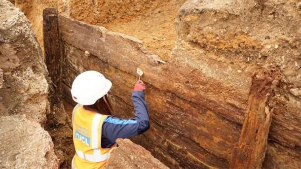 Archaeologists have discovered what they believe to be the long-lost Red Lion Theater, uncovering a rectangular timber structure with 144 surviving timbers. (Archaeology South-East / UCL)