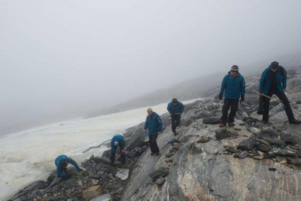 Archaeologists searching for artifacts near a receding glacier in 2011.