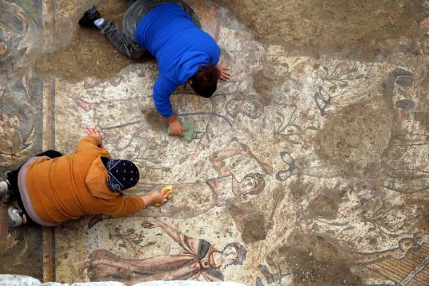 Archaeologists work on the Roman mosaic at the ancient city of Germanicia, Kahramanmaraş, southern Turkey. (DHA Photo)