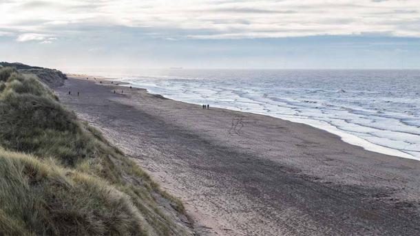 Archaeologists are uncovering fascinating details about the rise and fall of biodiversity based on the Merseyside footprints found at Formby Beach, seen here. This part of the Irish Sea coastline is home to one of the largest collection of prehistoric animal tracks on Earth. (Jason Wells / Adobe Stock)