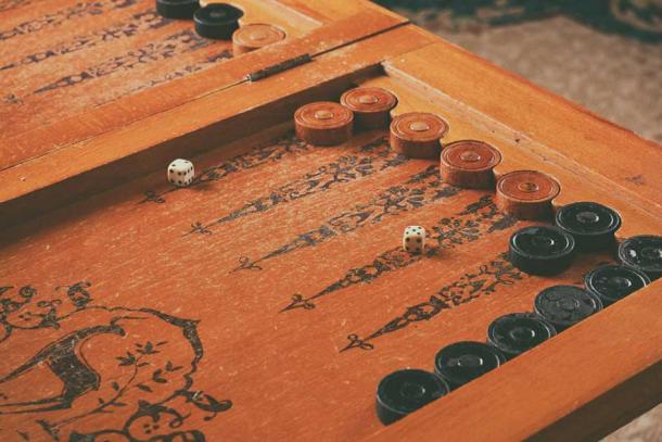 Backgammon board. (Vastram / Adobe Stock)