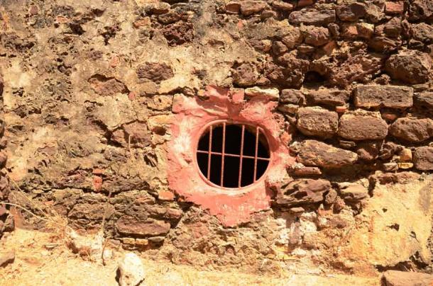 Barred window at Fort James Island, now Kunta Kinteh Island in Gambia. (virginievanos / Adobe Stock)
