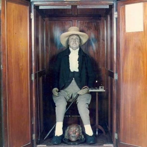 Bentham’s ‘Auto-Icon’ plus mummified head (now in a safe) in the South Cloisters of University College London. (Image: UCL)